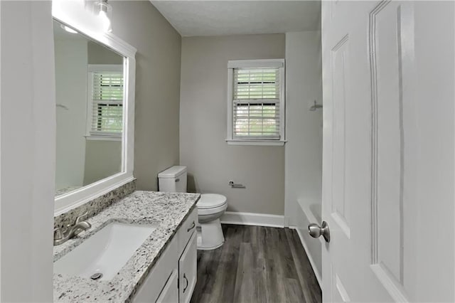 650 Lake Forest Ct, Roswell, GA 30076 - bathroom featuring vanity, wood finished floors, and shower / washtub combination