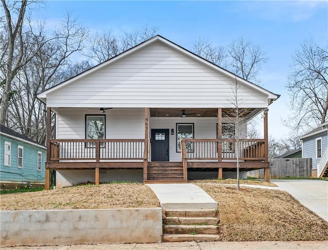 bungalow-style house with covered porch and a ceiling fan