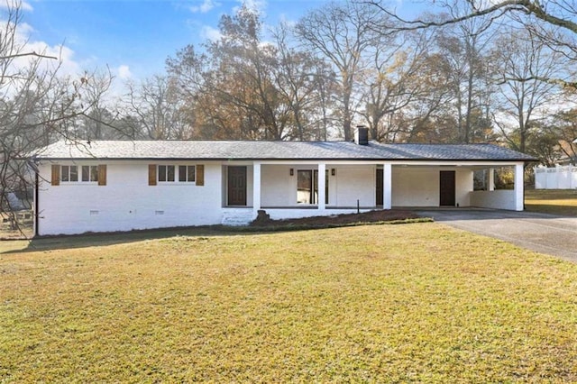 single story home featuring a carport, a porch, and a front yard