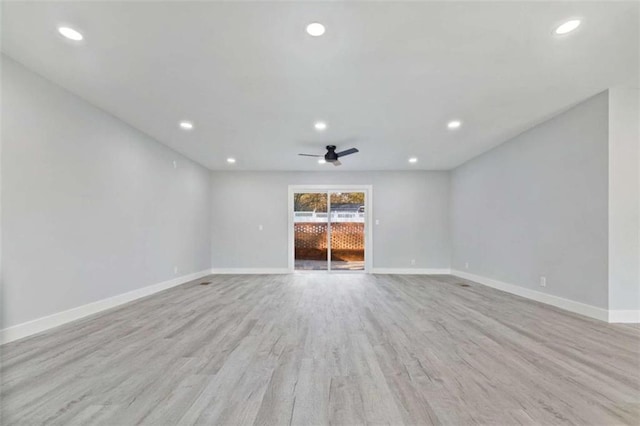 unfurnished living room with ceiling fan and light hardwood / wood-style floors