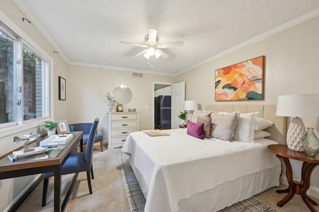 bedroom with light colored carpet, visible vents, crown molding, and ceiling fan