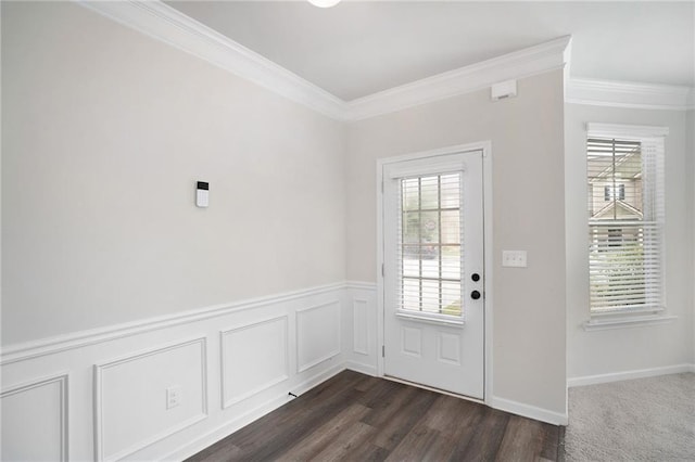 entryway with dark wood-type flooring and ornamental molding