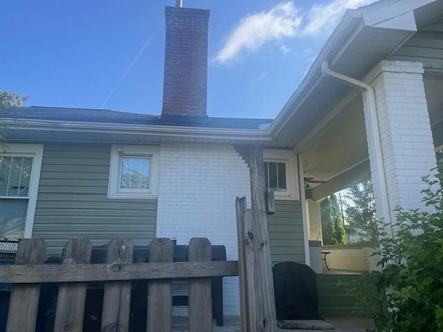 3101 E Point St, Atlanta, GA 30344 - view of side of property featuring a chimney and brick siding
