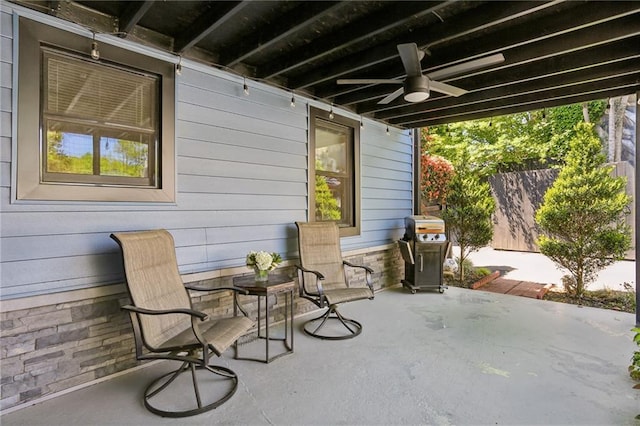 view of patio / terrace featuring a ceiling fan and grilling area