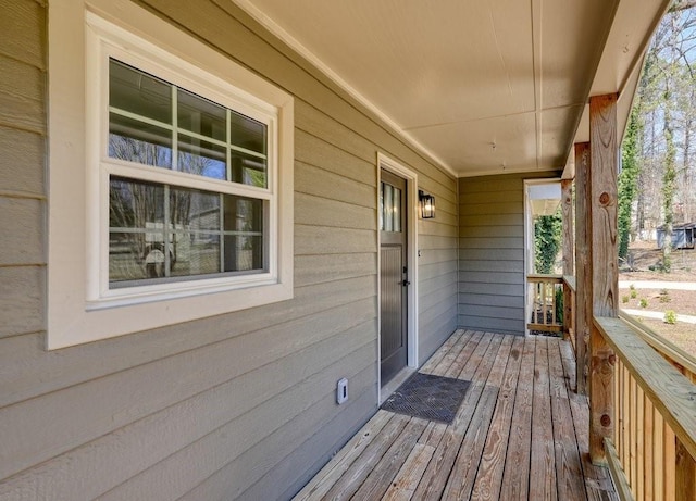 wooden deck featuring a porch