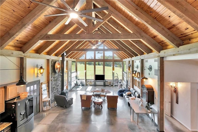 living room with concrete floors, beamed ceiling, high vaulted ceiling, and wood ceiling