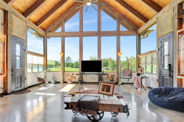 sunroom with wood ceiling, a healthy amount of sunlight, and vaulted ceiling with beams