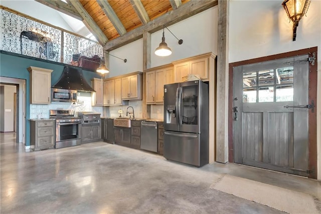 kitchen with stainless steel appliances, concrete flooring, decorative light fixtures, light brown cabinetry, and high vaulted ceiling