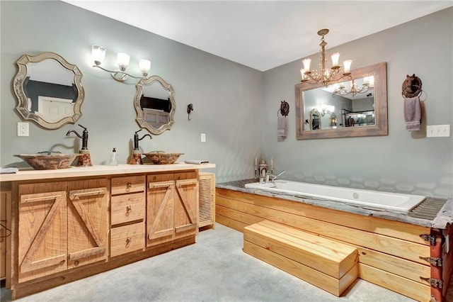 bathroom with a bathing tub, a chandelier, vanity, and concrete flooring