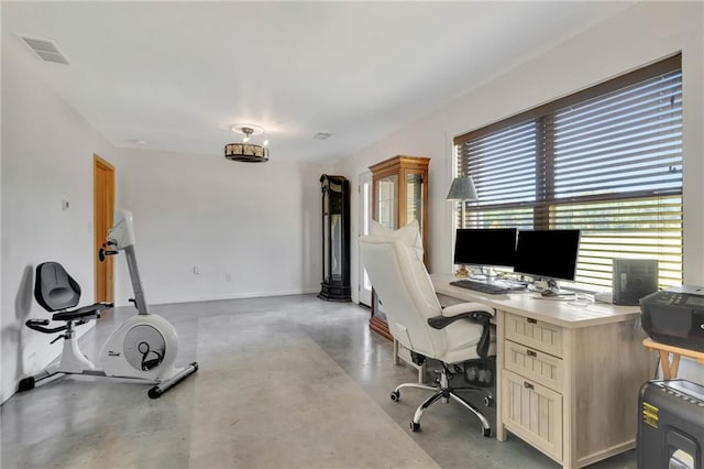 office with concrete flooring