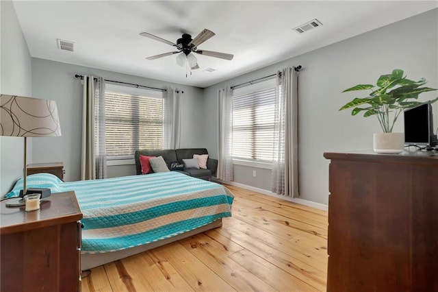 bedroom featuring hardwood / wood-style flooring and ceiling fan