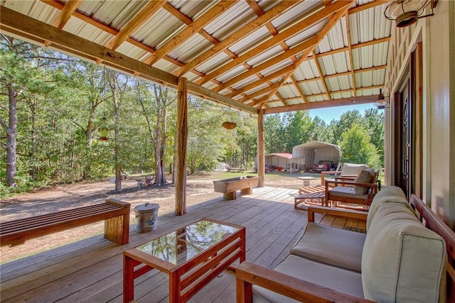 wooden deck with outdoor lounge area