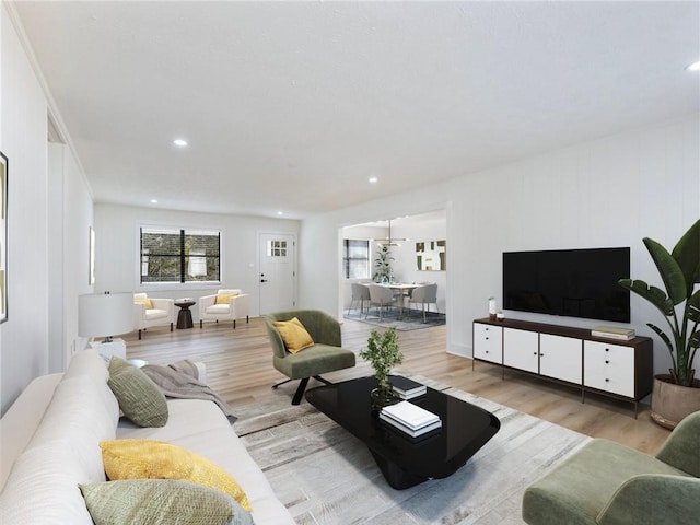 living room with a healthy amount of sunlight and light wood-type flooring