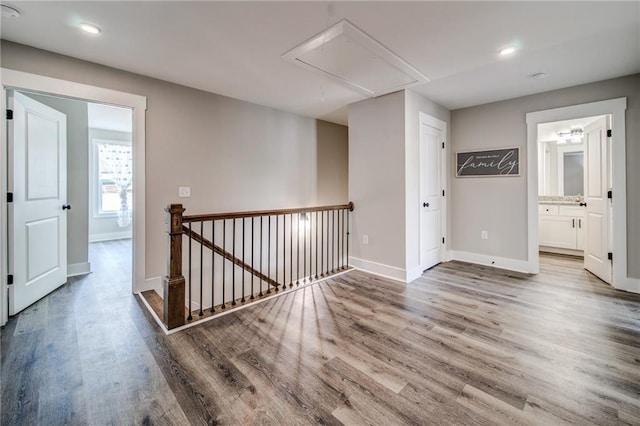 interior space with a notable chandelier and dark hardwood / wood-style floors