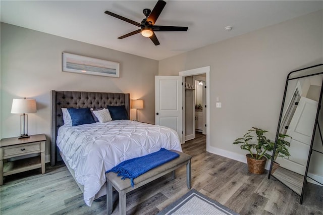 bedroom with ceiling fan and light hardwood / wood-style flooring