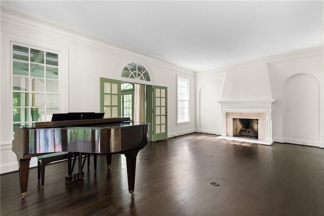 401 Peachtree Battle Ave NW, Atlanta, GA 30305 - living area with crown molding, a tile fireplace, dark wood-style floors, and baseboards