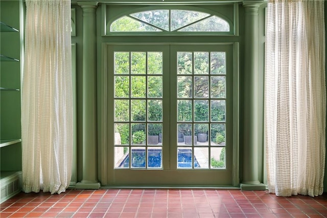 401 Peachtree Battle Ave NW, Atlanta, GA 30305 - entryway featuring ornate columns, tile patterned floors, and healthy amount of natural light