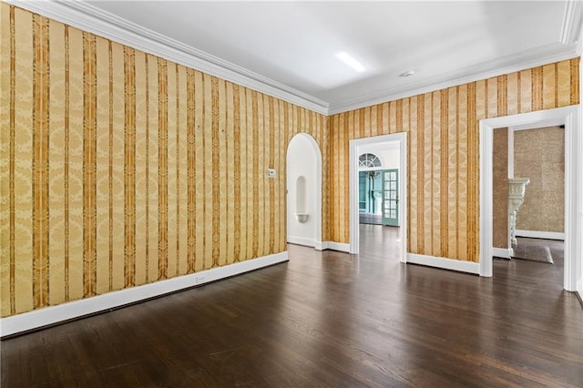 401 Peachtree Battle Ave NW, Atlanta, GA 30305 - unfurnished room with ornamental molding, wood finished floors, wallpapered walls, baseboards, and arched walkways