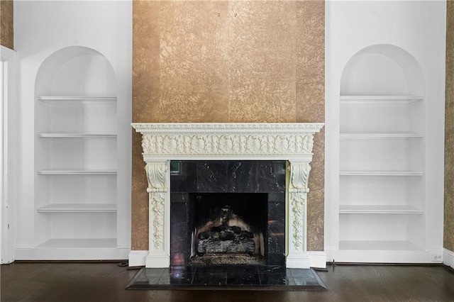 401 Peachtree Battle Ave NW, Atlanta, GA 30305 - detailed view of built in shelves, wood finished floors, a high end fireplace, and baseboards