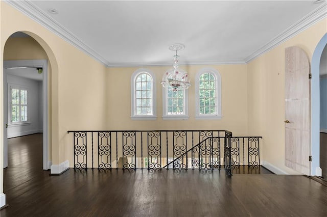 401 Peachtree Battle Ave NW, Atlanta, GA 30305 - hallway with arched walkways, plenty of natural light, ornamental molding, wood finished floors, and baseboards