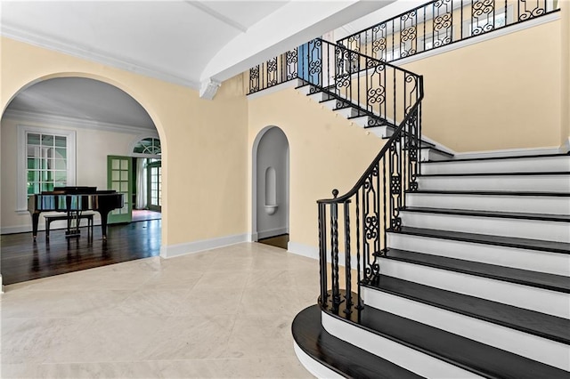 401 Peachtree Battle Ave NW, Atlanta, GA 30305 - stairway with arched walkways, baseboards, ornamental molding, and tile patterned floors
