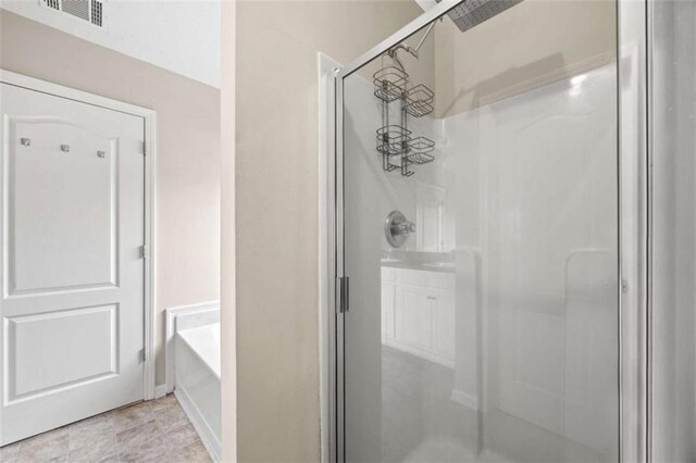 bathroom with independent shower and bath