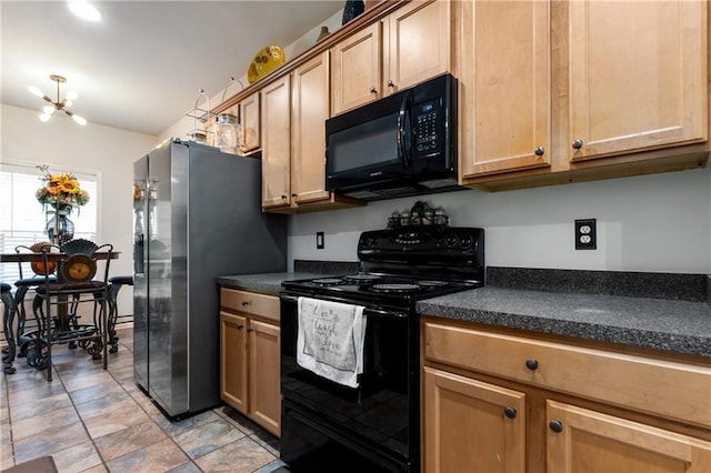 kitchen with dark countertops and black appliances