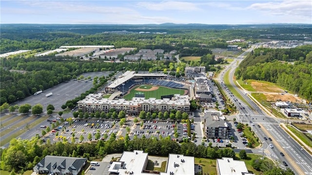 bird's eye view featuring a wooded view