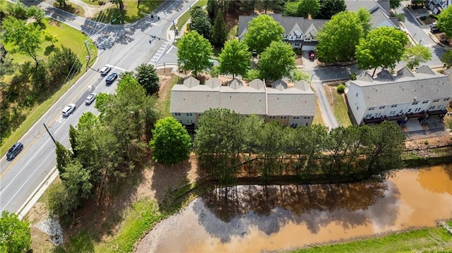 aerial view with a water view and a residential view