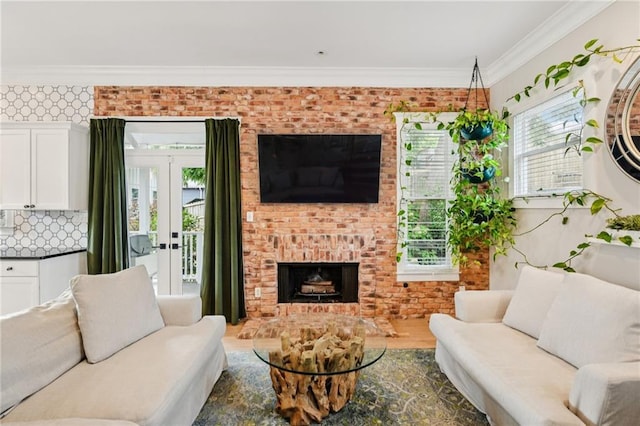218 S Ave SE, Atlanta, GA 30315 - living area with wood finished floors, ornamental molding, a fireplace, and french doors