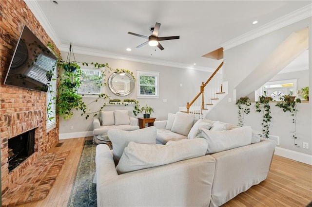 218 S Ave SE, Atlanta, GA 30315 - living room with hardwood / wood-style flooring, stairway, a ceiling fan, a brick fireplace, and recessed lighting