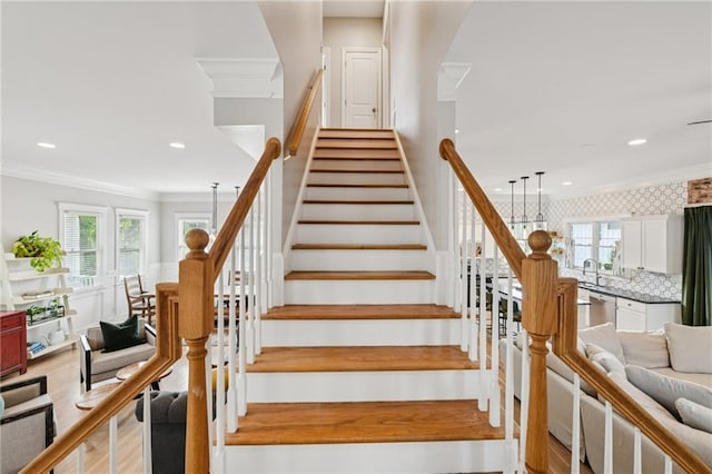 218 S Ave SE, Atlanta, GA 30315 - staircase featuring ornamental molding, recessed lighting, and wood finished floors