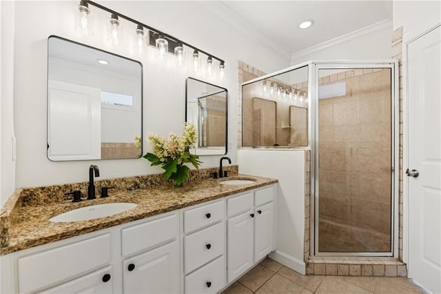 218 S Ave SE, Atlanta, GA 30315 - full bath with ornamental molding, double vanity, a shower stall, tile patterned flooring, and recessed lighting