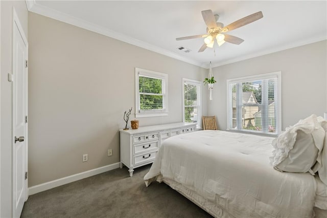 218 S Ave SE, Atlanta, GA 30315 - bedroom featuring multiple windows, crown molding, baseboards, dark colored carpet, and a ceiling fan