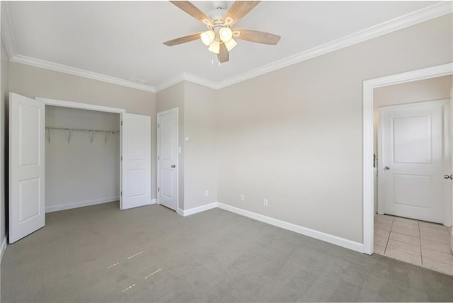 218 S Ave SE, Atlanta, GA 30315 - unfurnished bedroom with carpet flooring, baseboards, ornamental molding, a closet, and ceiling fan