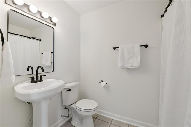218 S Ave SE, Atlanta, GA 30315 - full bath with tile patterned flooring, toilet, and baseboards