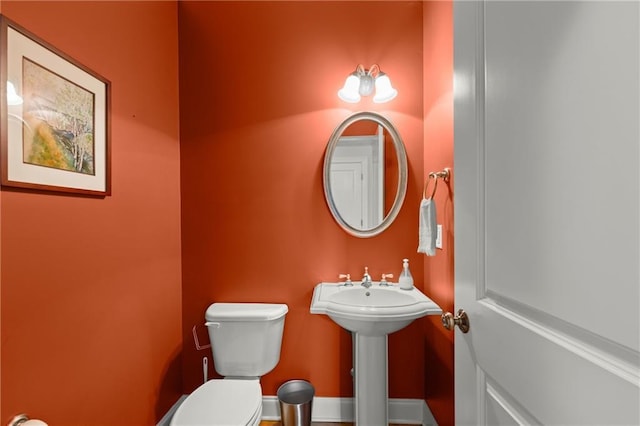 541 Brown Dr, Clermont, GA 30527 - bathroom with toilet and a sink