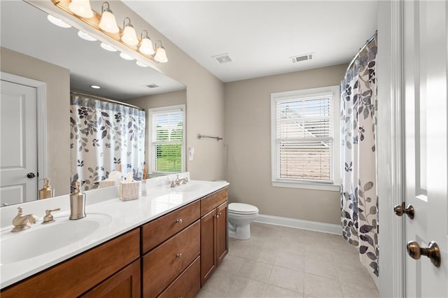 541 Brown Dr, Clermont, GA 30527 - full bath with double vanity, toilet, baseboards, tile patterned floors, and curtained shower
