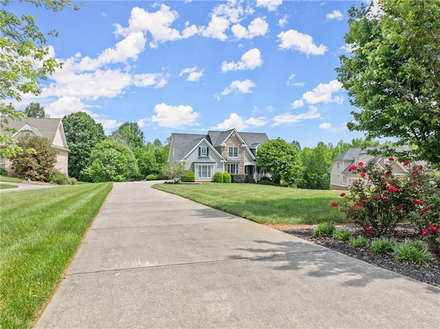 541 Brown Dr, Clermont, GA 30527 - view of front of house featuring a front lawn and concrete driveway