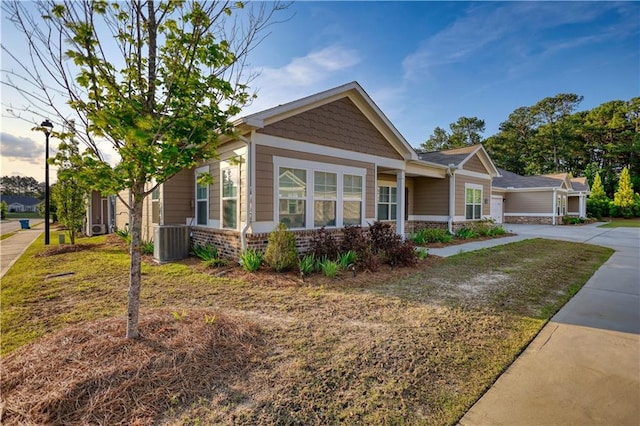 2929 Rambler Dr, Loganville, GA 30052 - view of front of property with driveway and central AC