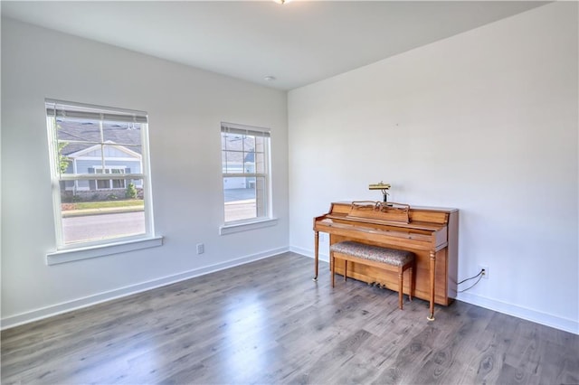 2929 Rambler Dr, Loganville, GA 30052 - sitting room with wood finished floors and baseboards