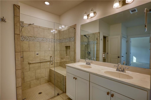 2929 Rambler Dr, Loganville, GA 30052 - full bathroom featuring a shower stall and double vanity