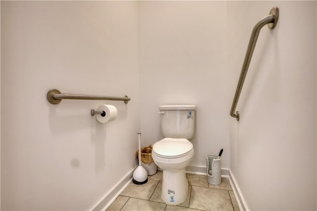 2929 Rambler Dr, Loganville, GA 30052 - bathroom featuring toilet, tile patterned flooring, and baseboards