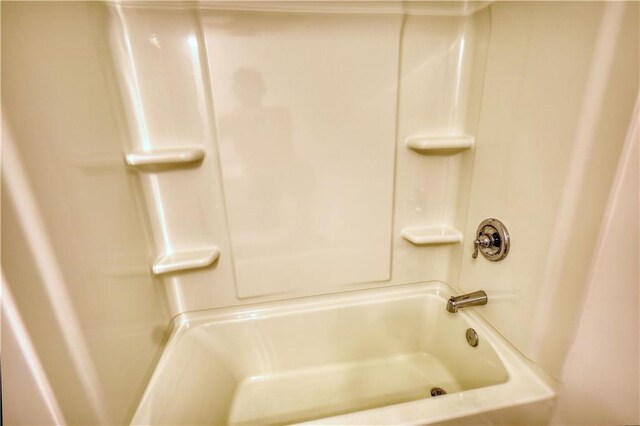 2929 Rambler Dr, Loganville, GA 30052 - full bathroom featuring bathtub / shower combination