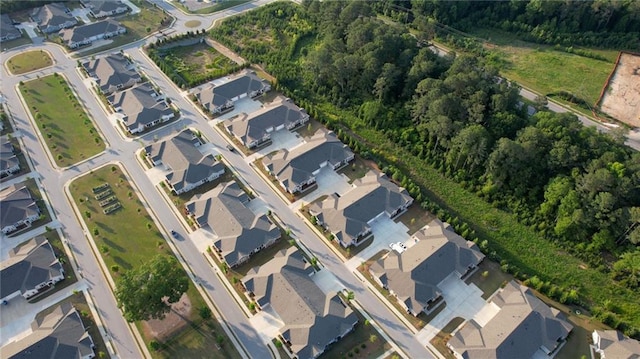 2929 Rambler Dr, Loganville, GA 30052 - aerial overview of property's location with nearby suburban area and a forest