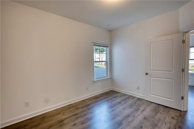 2929 Rambler Dr, Loganville, GA 30052 - empty room with wood finished floors and baseboards