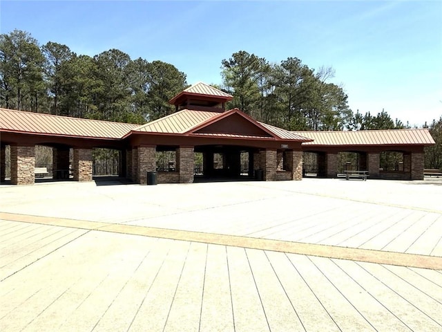 view of property's community with a carport