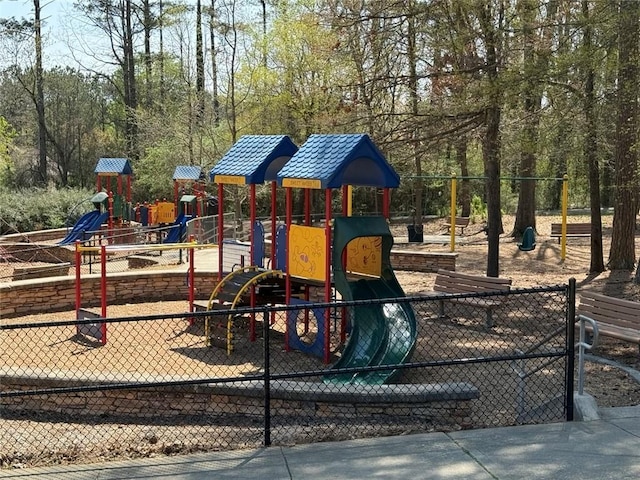 community play area featuring fence