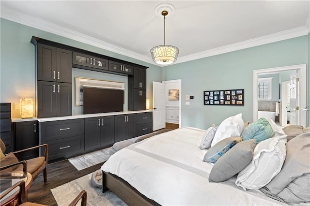 bedroom featuring dark hardwood / wood-style flooring and crown molding