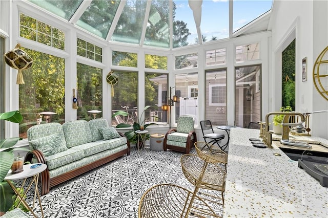 sunroom / solarium featuring sink